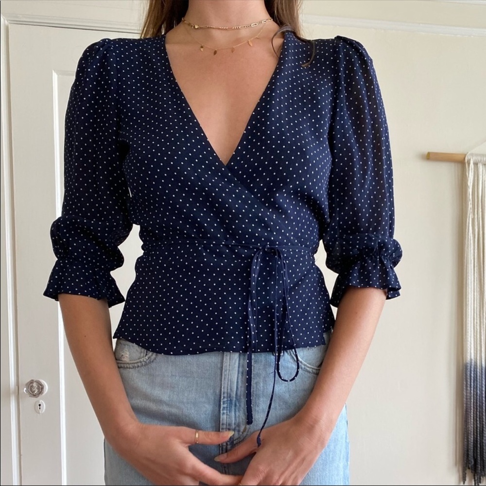 - Polka dot wrap Reformation top